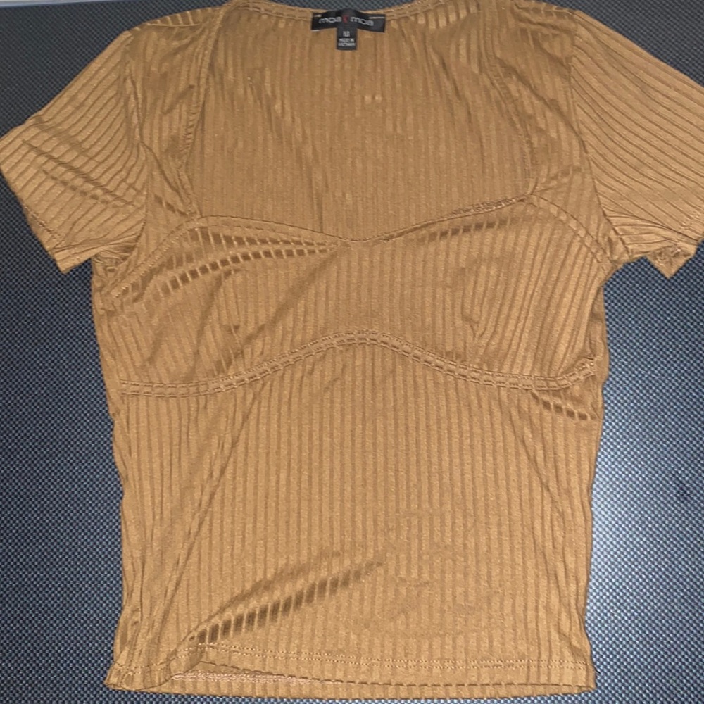 The shirt is lightweight and is low on the chest area